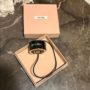 Miu Miu Black and Gold Logo Hair Cuff with Elastic